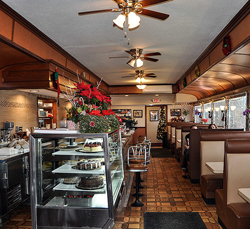 “They don’t make ‘em like this anymore,” John Kritikos says of the New Munson Diner and its classic interior design. New booths, tables and cases gleam inside where dad Christos claims that “you can eat off the floors.”