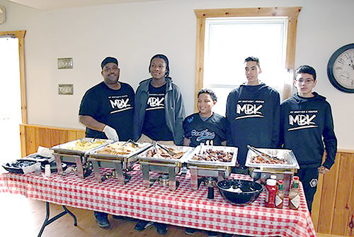 Photo contributed by the Dispute Resolution Center

Volunteers from My Brother&rsquo;s Keeper helped serve breakfast for children December 15.