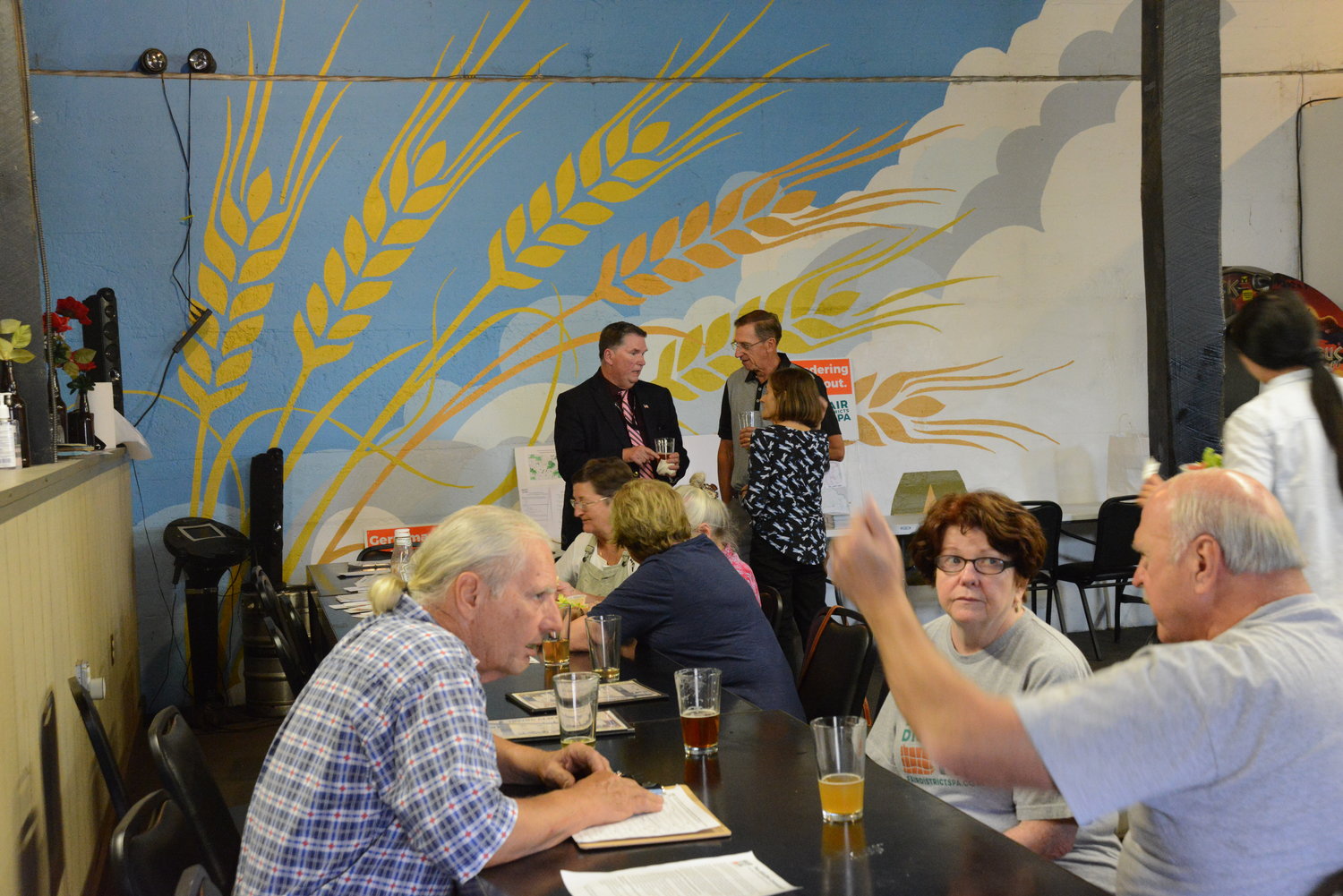 Wayne County residents discuss politics over some beer and food at the Iriving Cliff Brewery.