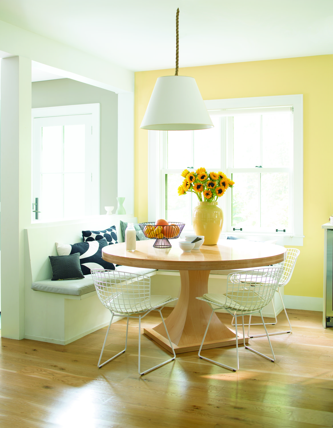 This cheery yellow room by Benjamin Moore Paints is a perfect good morning for your kitchen or breakfast nook.