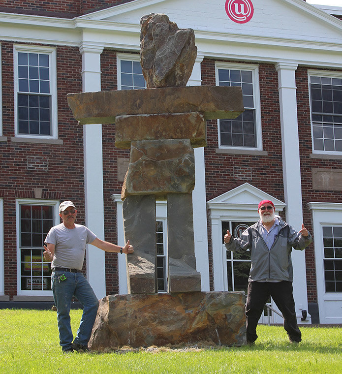 Wayne Holbert, left, poses with Pat Carullo after completion of the stone statue in front of the Narrowsburg Union.