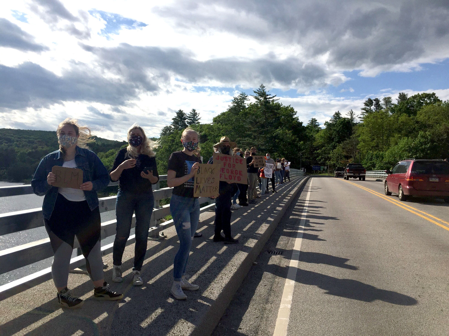 Over 50 people gathered on the Narrowsburg bridge at 5 pm to demonstrate concern and solidarity for people of color who experience oppression in their daily lives.