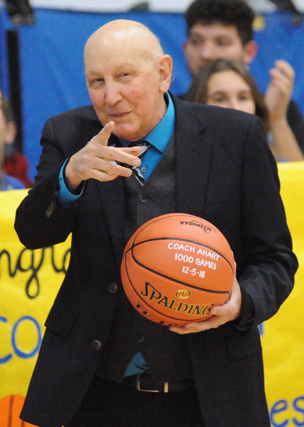 A milestone accomplishment. On December 5, 2018, Fred Ahart posted his 1,000th game as Roscoe’s boys’ basketball coach in the gym named in his honor. The Blue Devils edged Seward 54-52, in a matchup that saw Ahart’s friend and coach Rob Gravelle post his 500th game as helmsman of the Spartans.