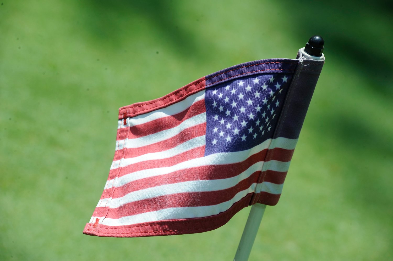 Signs of things to come. On Monday, August 31, the Country Club at Woodloch Springs will host the 7th Annual Folds of Honor Golf Classic. The Folds of Honor Foundation’s mission is dedicated to ensuring that “no family is left behind in the fight to preserve American freedom.” The small American Flag flies on the putting practice green by the clubhouse.