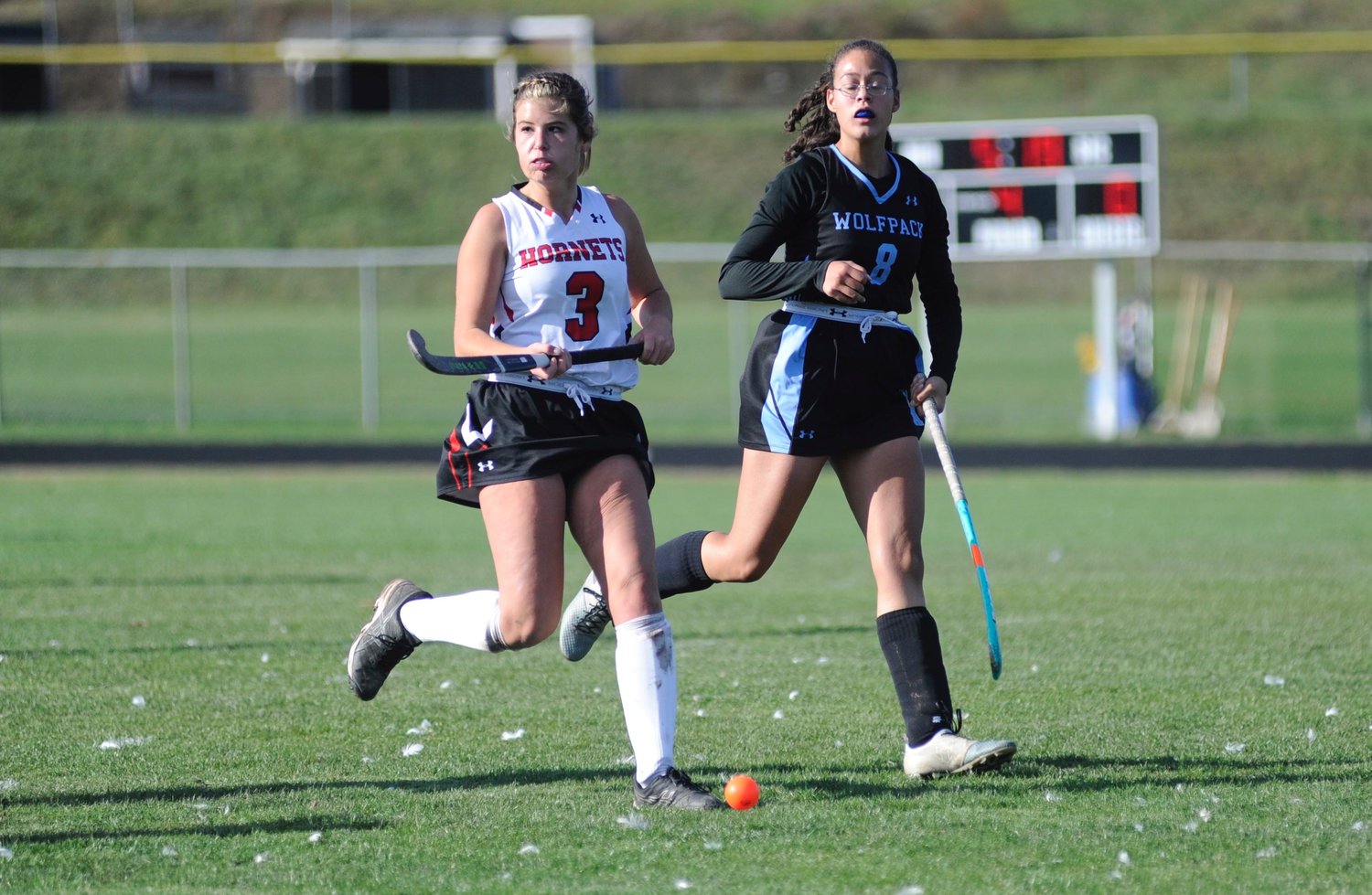 Synchronicity in motion. Honesdale’s Brynn McGinnis and Wilkes Barre’s Selena Everts match each other stride-for-stride.