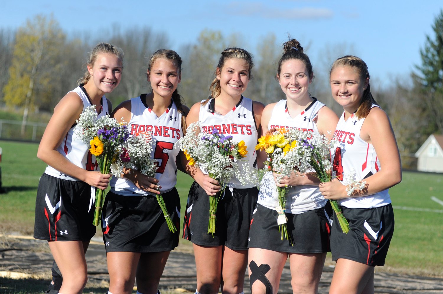 We are the seniors! Honesdale’s senior field hockey scholar-athletes played their final home game at the Home of the Hornets. Pictured are Leah Krol (scored the second goal of the match), left, Gina Dell’Aquila, Brynn McGinnis, co-captain Grace Maxson and co-captain Sarah Meyer, who posted her team’s first goal.