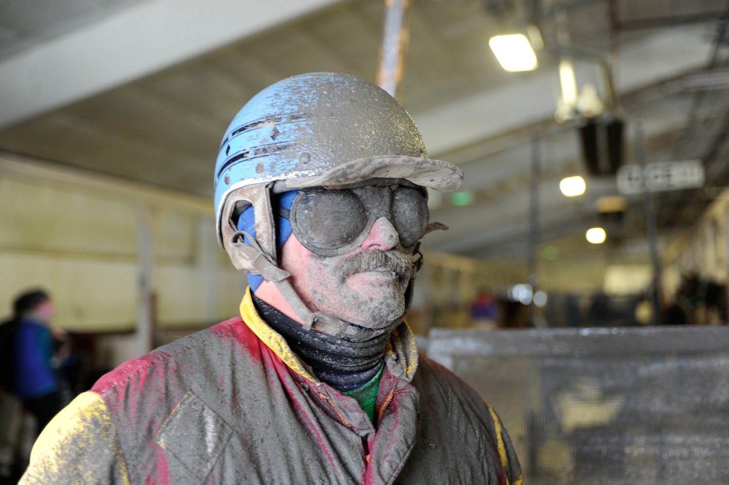 Here’s mud in your face! Veteran horseman driver Bobby Merton returned to the paddock after a warm-up circuit on the muddy track. The racing card for January 5 was canceled due to hazardous conditions as the track thawed.
