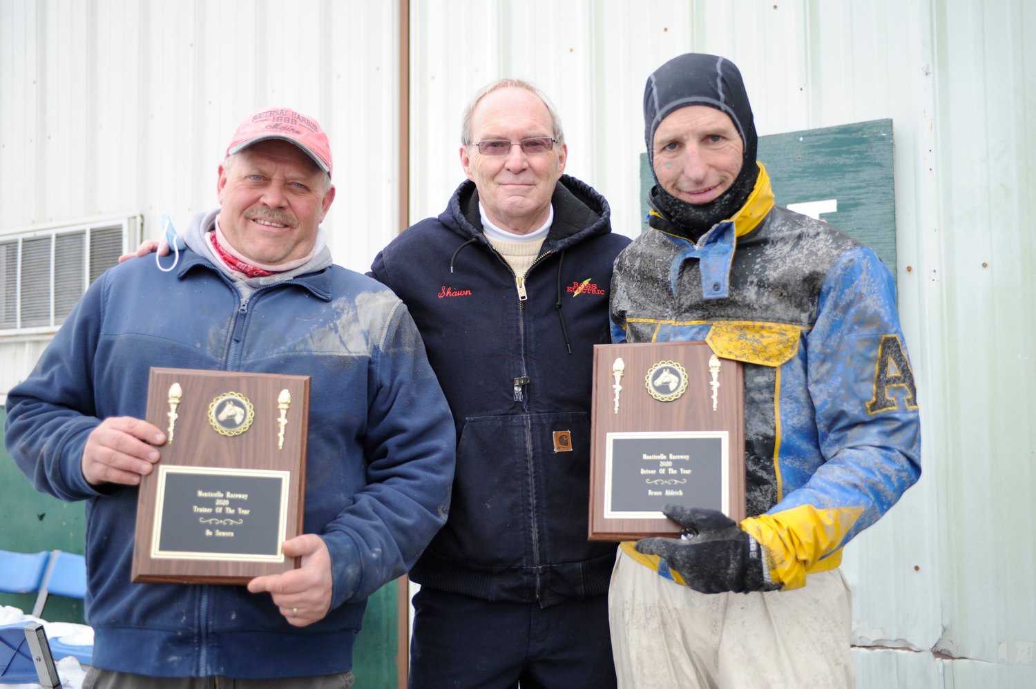 High stakes and top honor. Pictured are Philip “Bo” Sowers Jr. (Monticello Raceway’s 2020 Trainer of the Year), left, Shawn Wiles (executive director of racing and facilities) and Bruce Aldrich Jr. (Monticello Raceway’s 2020 Driver of the Year).