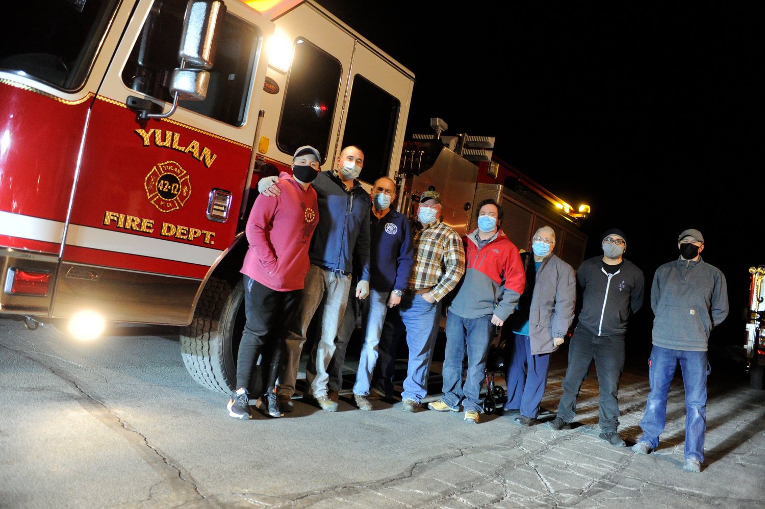 Guardians of the community. Members of the Yulan Volunteer Fire Department pose by the department’s recently acquired Class A pumper. This year marks the 75th Anniversary of the Yulan Fire Department.