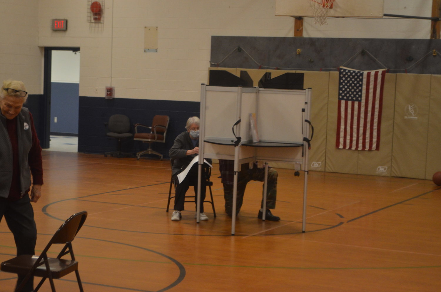 Voters in the polling booth at the Duggan Community Center in Bethel.