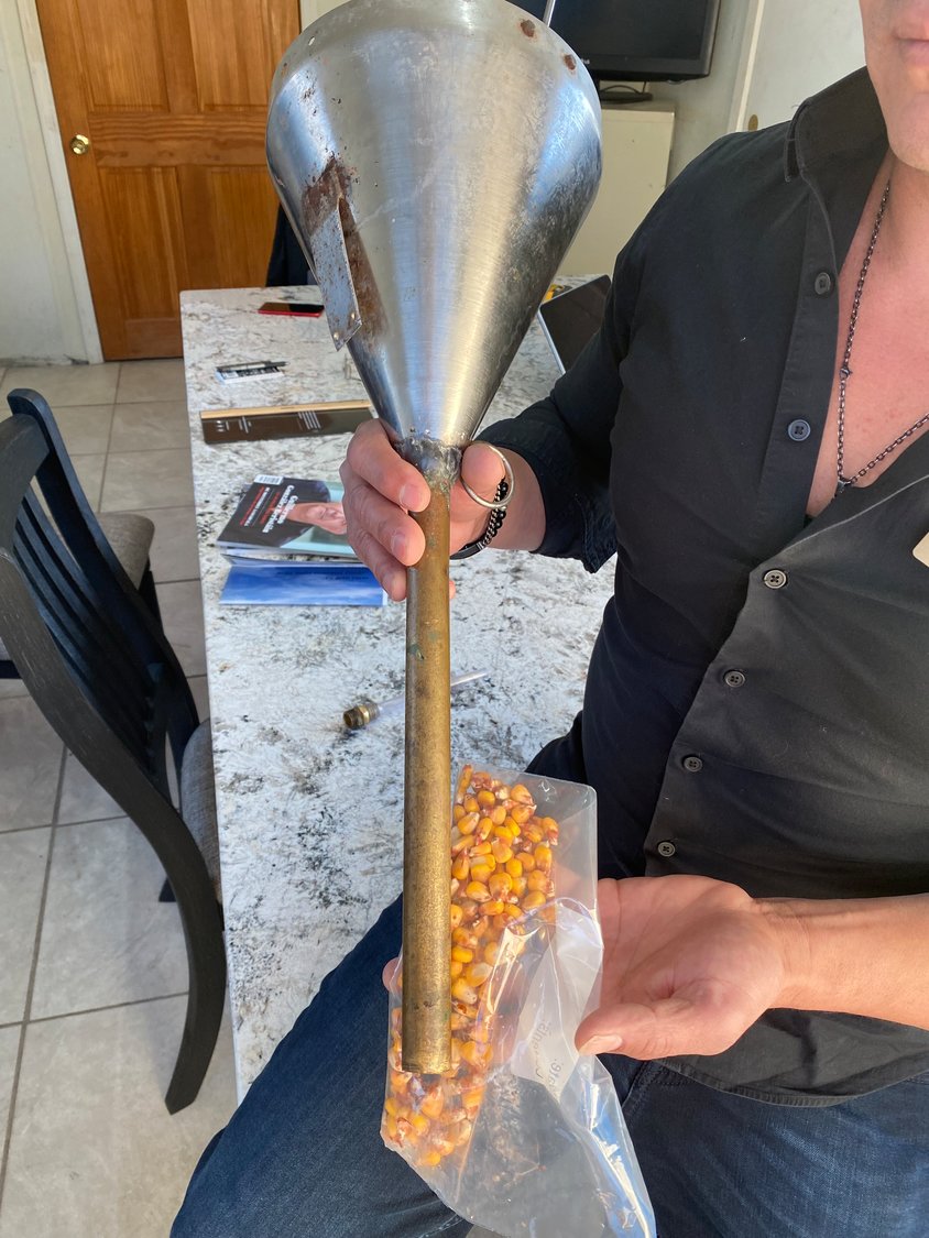 This metal feeding tube is dated technology and no longer in use at Hudson Valley and La Belle; the Moulards are now fed a mixture of water and ground grain instead of kernels of corn.