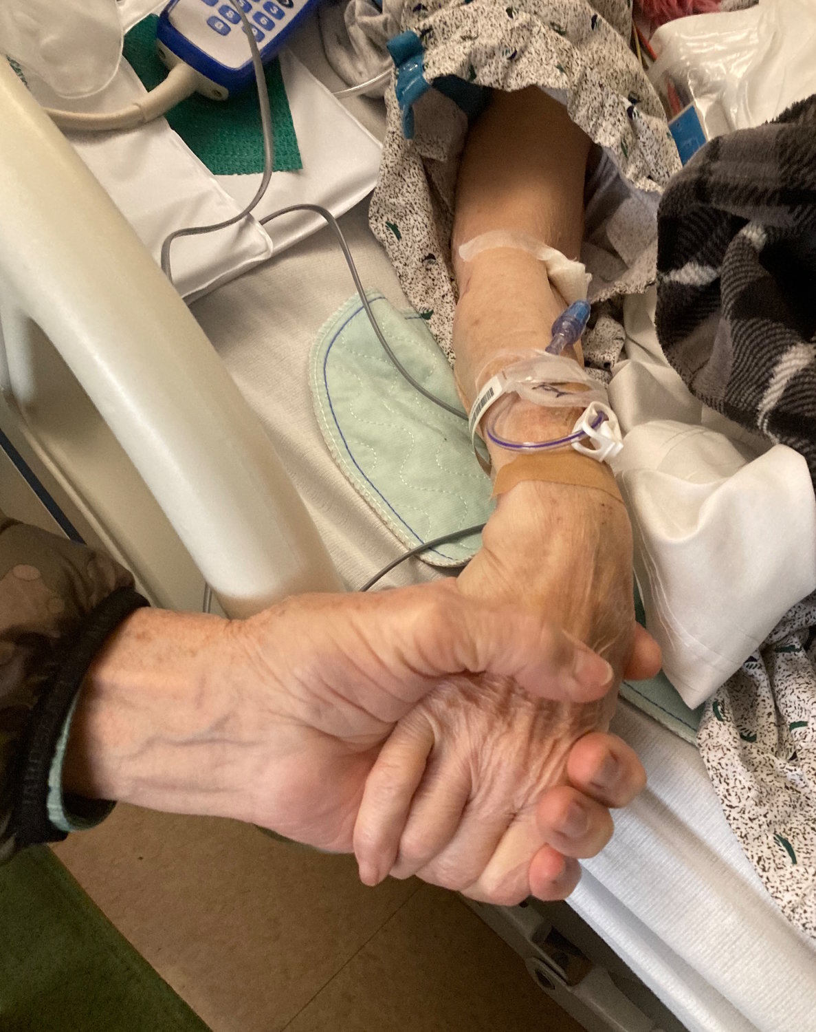 My parents join hands to comfort each other in this current stage of their long journey together. Mom has been discharged from the hospital into a care facility and Dad remains by her side.