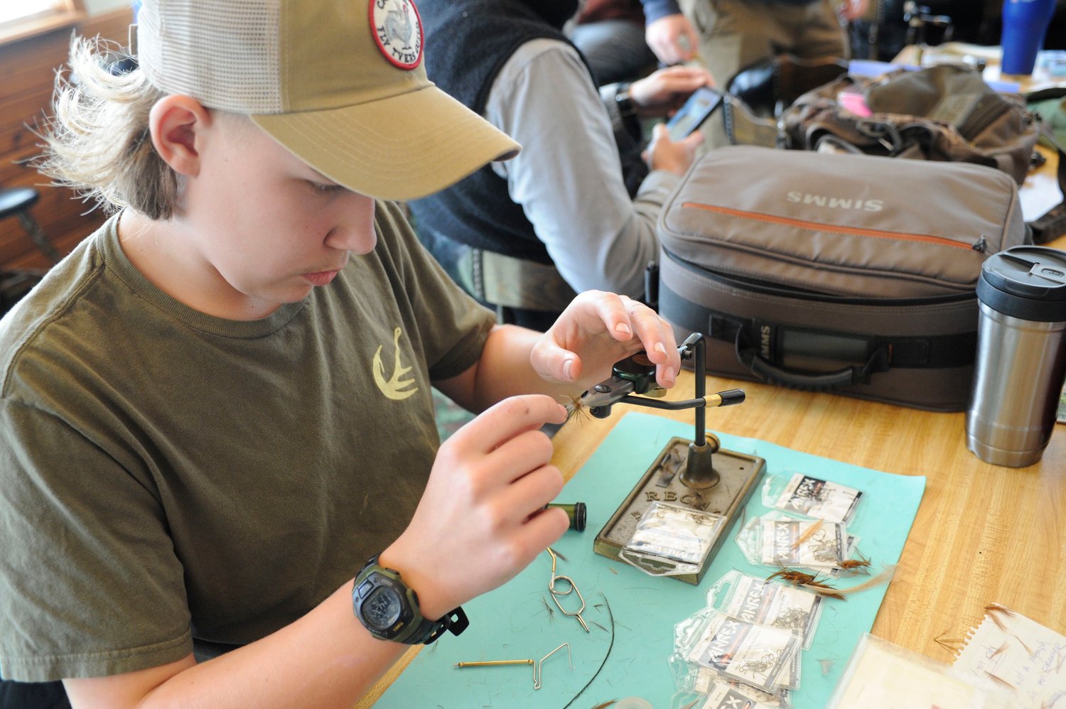 Andrew Sander, 13, of East Meredith, NY, was joined at Fly Fest 2022 by his father Henry, part of a self-described outdoors family. Andrew was mentored in the art of fly-tying by Joe Ceballos, president of the Catskill Fly Tyers Guild.