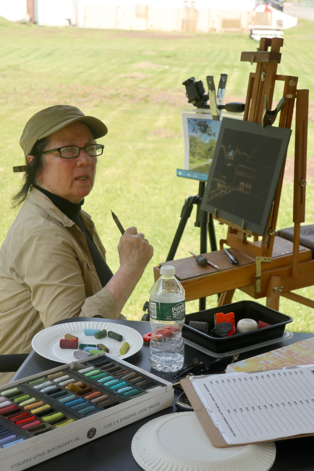 Karen Meneghin, founder of Zane Grey Plein Air, works on a small painting.