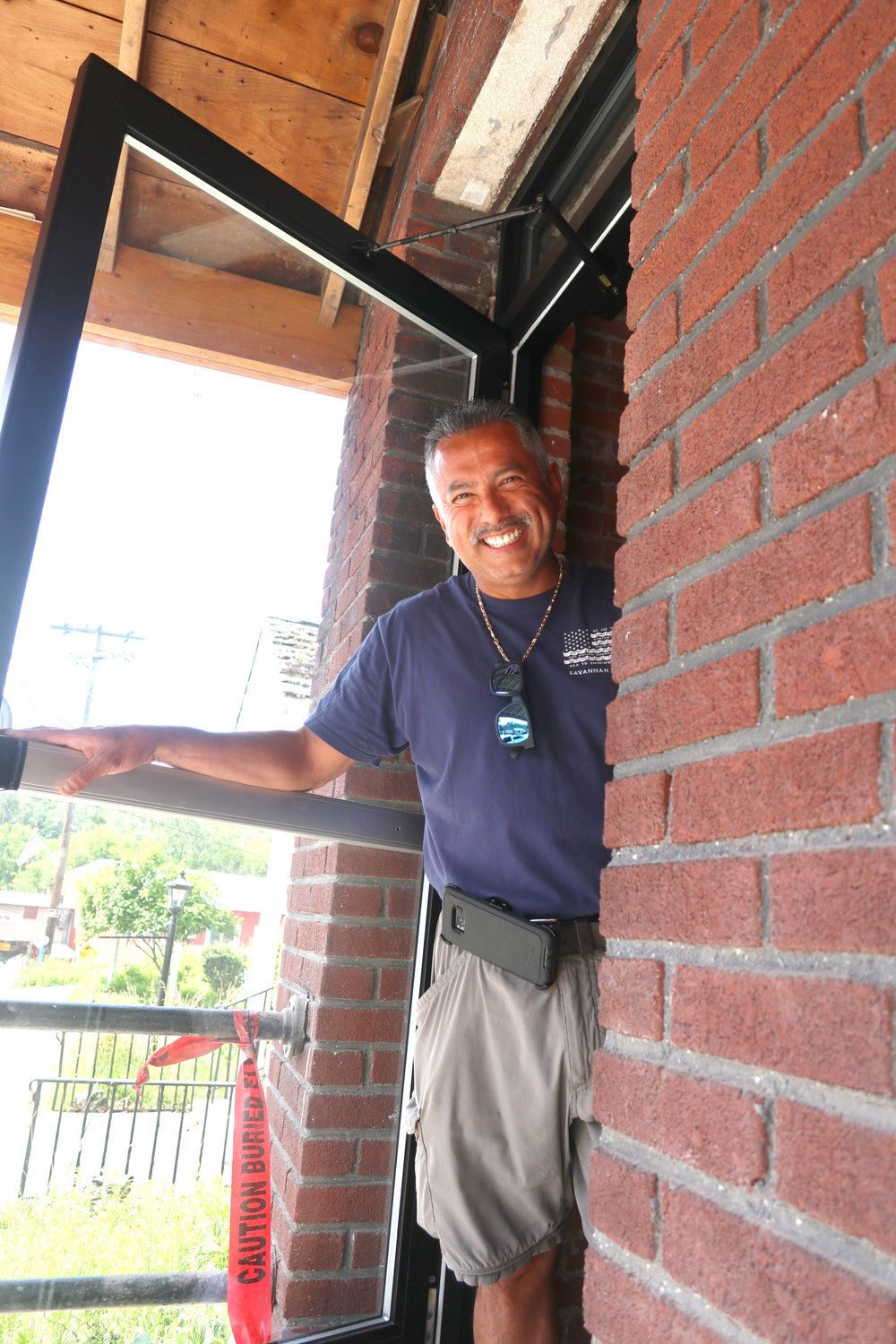 Nick Santana stands in one of the newly installed doorways that will lead to the Narrowsburg Shops & Market,  a multi-space commercial building, on Main Street.