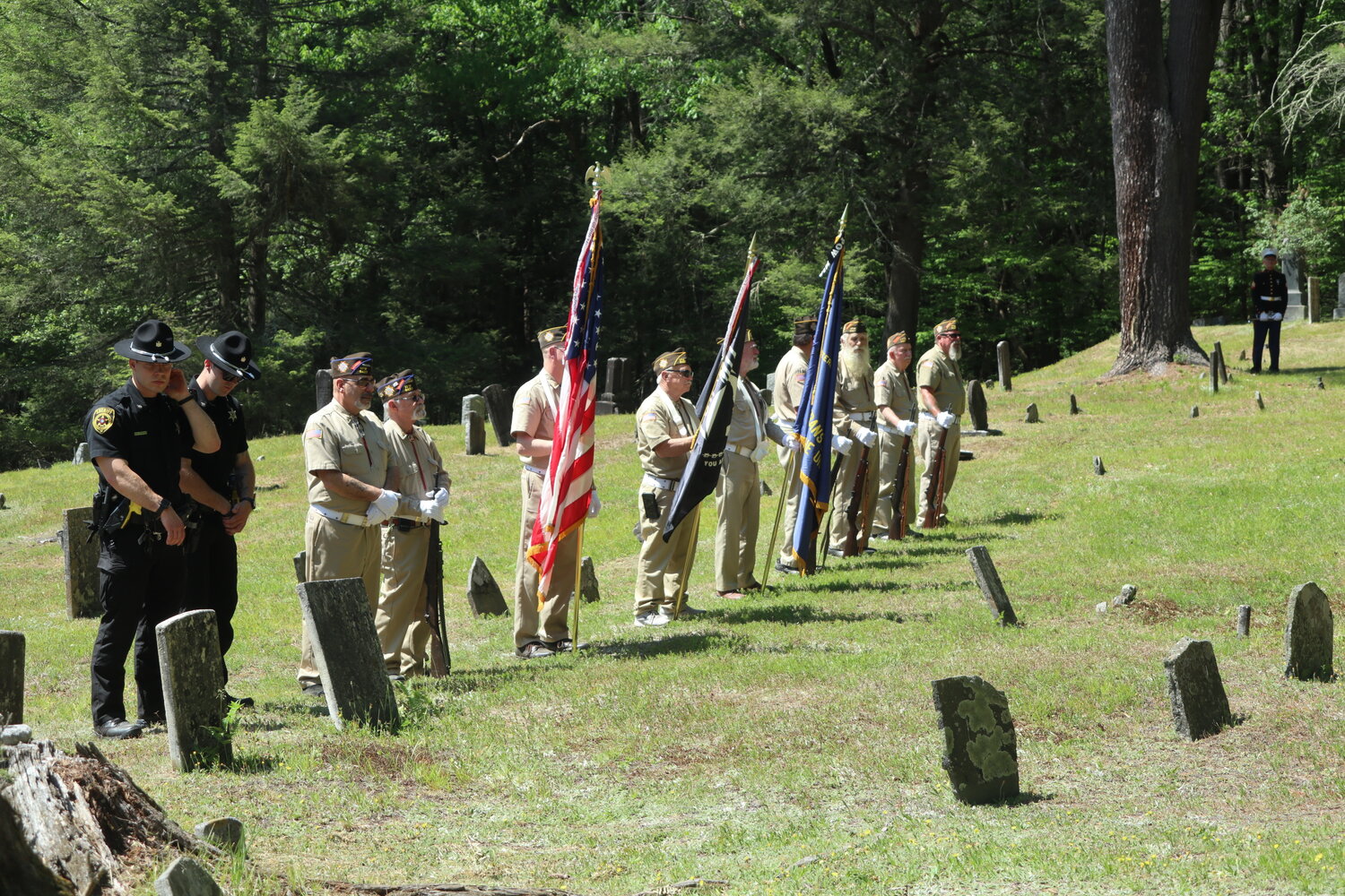 Members of the Tusten-Highland-Lumberland VFW Post 6427, joined by members of the Sullivan County Sheriff’s Department, conducts graveside services. Trumpeter Gary Skotch, pictured right, provided taps.